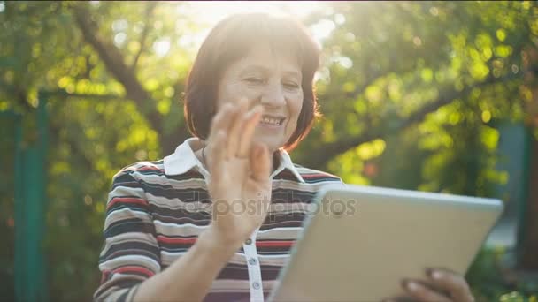 Aged Woman Talking by Skype — Stock Video
