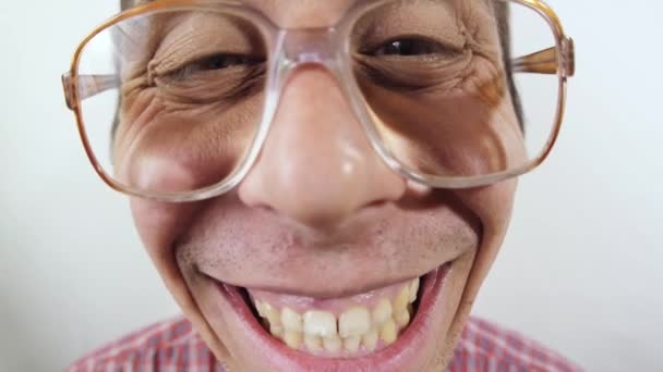 Funny nerd in glasses laughs — Stock Video