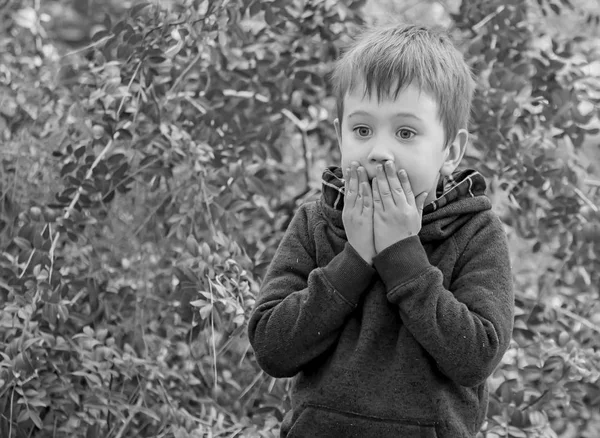 A scared kid black and white. — Stock Photo, Image