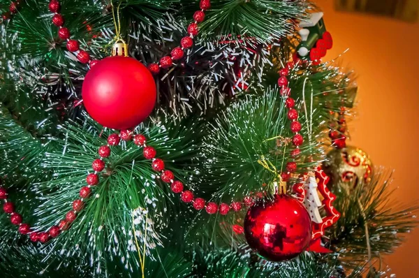 A Christmas tree (or a New Year tree) with beautiful festive decoration ornament. Xmas tree stock image, New Year concept