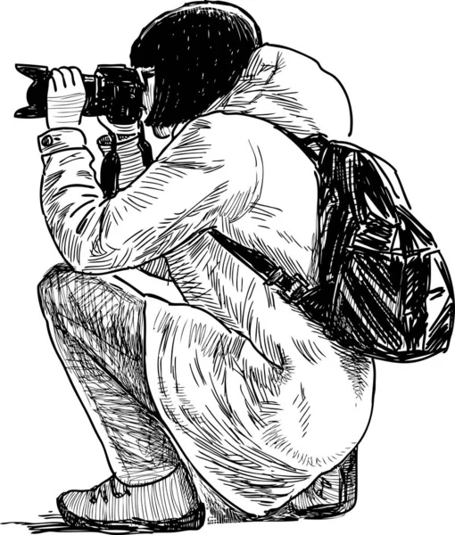 Skizze Eines Fotografenmädchens Das Hockt Und Mit Der Kamera Fotografiert — Stockvektor