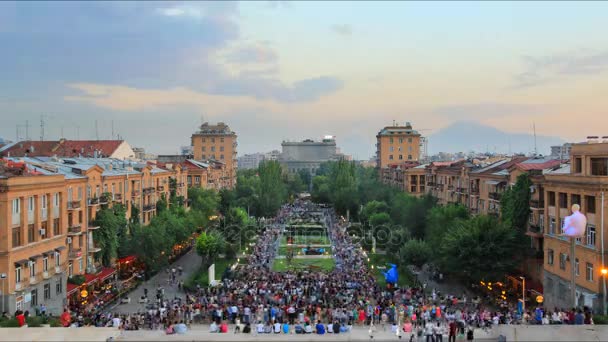 Time lapse, crowd of people in the background of a landscape with blue sky and clouds — Stock Video