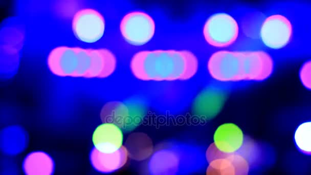 Disco blue, pink, orange lights out of focus. Abstract bokeh. — Stock Video