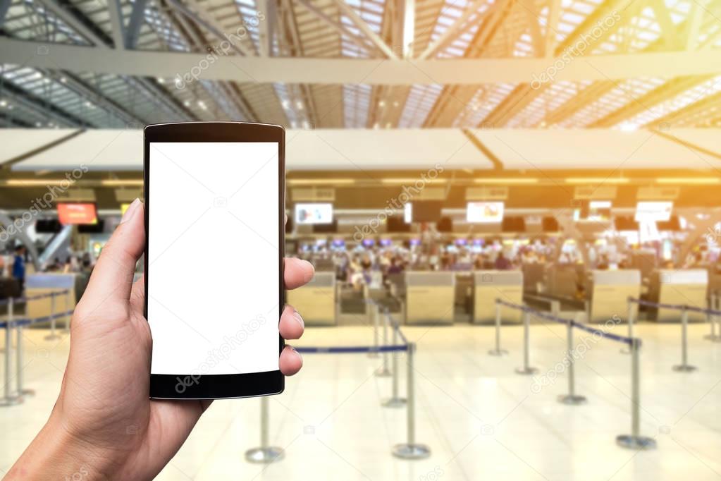 man's hands holding smart phone with blank copy space screen for