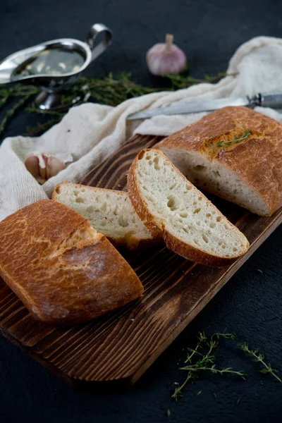 The Italian bread ciabatta with garlic and herbs