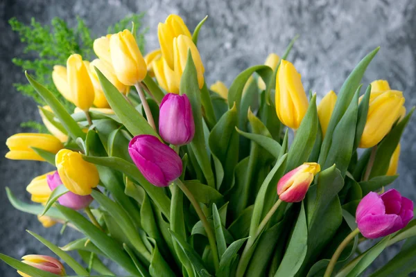 Bouquet from multi-colored tulips