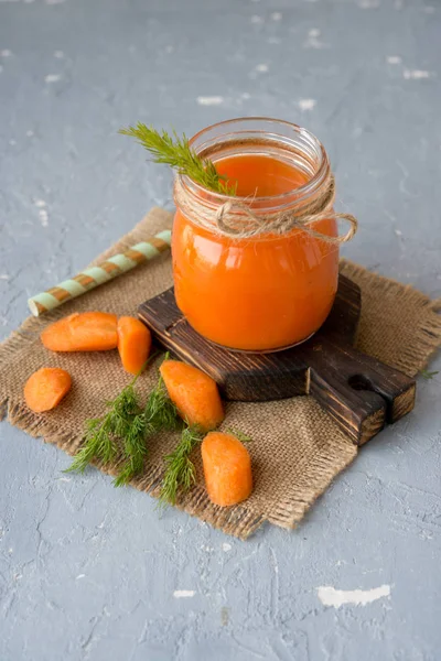 Freshly squeezed carrot juice in a jar