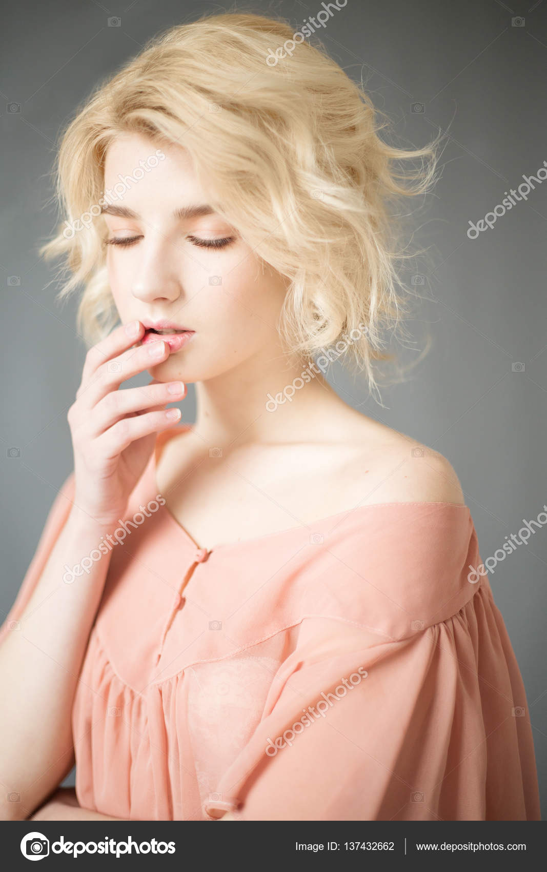 Young Blonde Woman With Blue Eyes Portrait Of A Beautiful Blonde