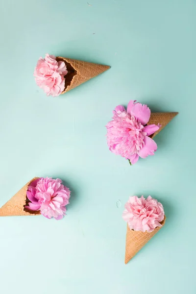 Pink flowers in waffle cones