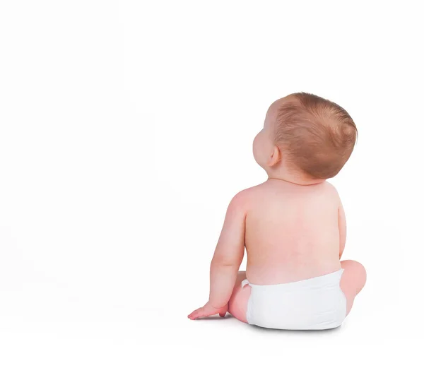 Bebé niño sentado mirando hacia atrás — Foto de Stock
