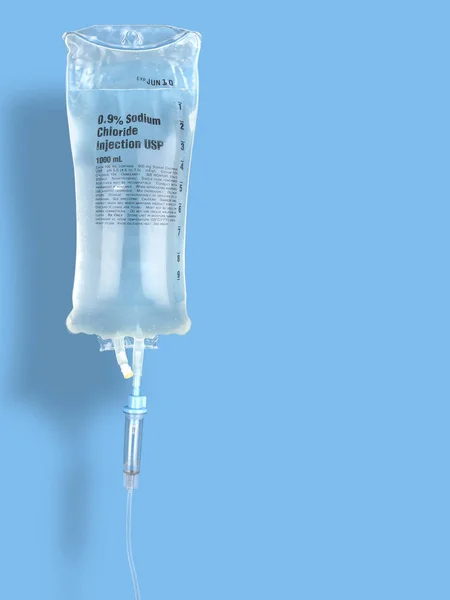 IV drip chamber, IV tubing, and IV bag of solution with copy space — Stock Photo, Image