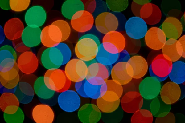 Luzes de guirlanda embaçadas abstratas. Fundo para o Natal e Ano Novo — Fotografia de Stock