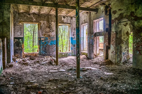 Old abandoned factory building in the forest in Moscow region, Russia