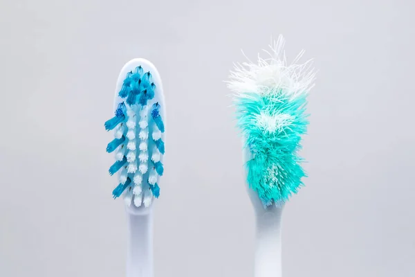 Image of used old and new toothbrushes isolated on a white backg — Stock Photo, Image