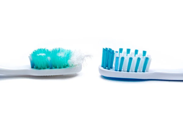 Image of used old and new toothbrushes isolated on a white backg — Stock Photo, Image