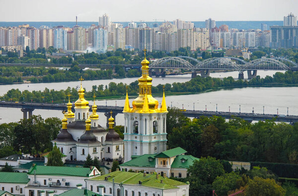 Architectural complex on Distant Caves in Kyiv Pechersk Lavra monastery and Dnieper river, Kyiv, Ukraine. High angle view. UNESCO World Heritage Site