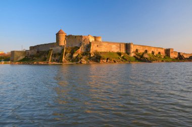 Picturesque view of medieval Akkerman Fortress in Bilhorod-Dnistrovskyi, Odesa region, Ukraine from Dniester Liman clipart