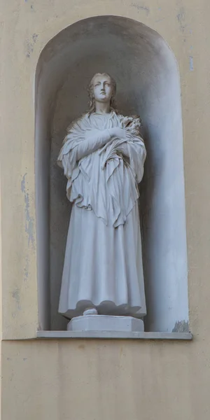 Statue woman set in a niche — Stock Photo, Image