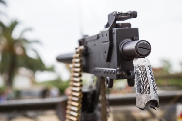 Machine gun mounted on a military vehicle