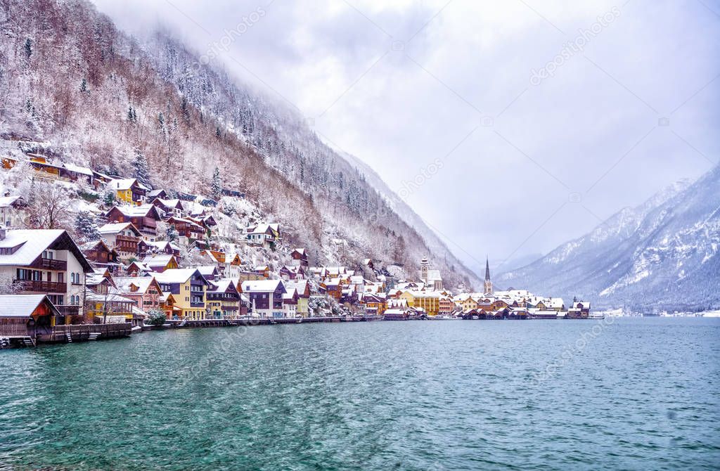Winter in the Hallstatt town on a lake in Alps mountains, Austri