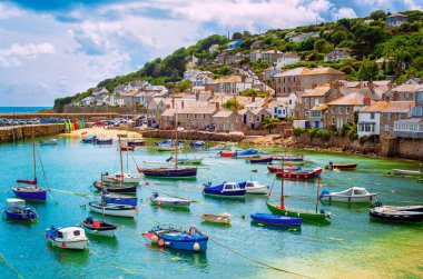 Mousehole village and fishing port in Cornwall, England, United Kingdom. Mousehole lies within the Cornwall Area of Outstanding Natural Beauty clipart
