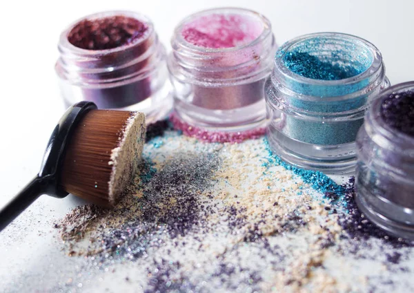 Beautiful pigments and makeup brush. — Stock Photo, Image