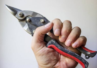 Scissors in hand