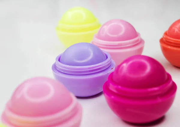 Lip balms on white — Stock Photo, Image