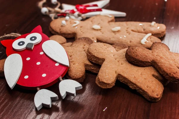 Biscuit boy with bright ornaments for Christmas. — Stock Photo, Image