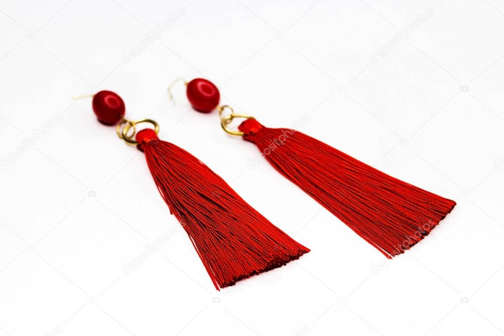 A pair of beautiful earrings of red color