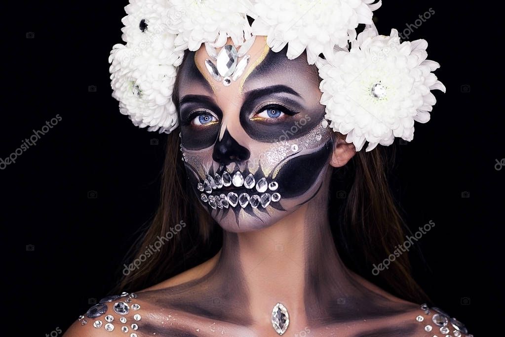 Professional make-up with flowers. Make up for Halloween.