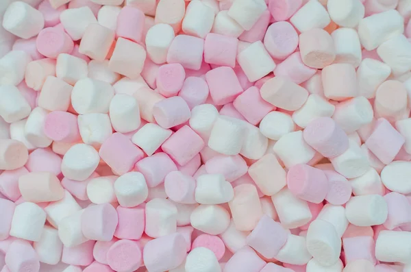 Barevné mini marshmallows pozadí — Stock fotografie