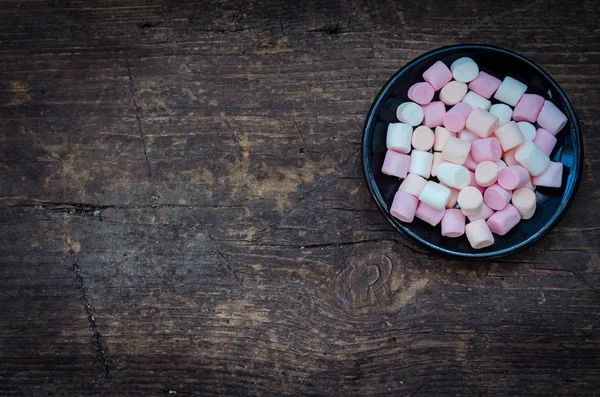 Barevné mini marshmallows pozadí — Stock fotografie