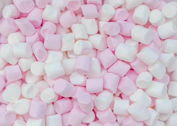 Růžové a bílé mini marshmallows pozadí — Stock fotografie