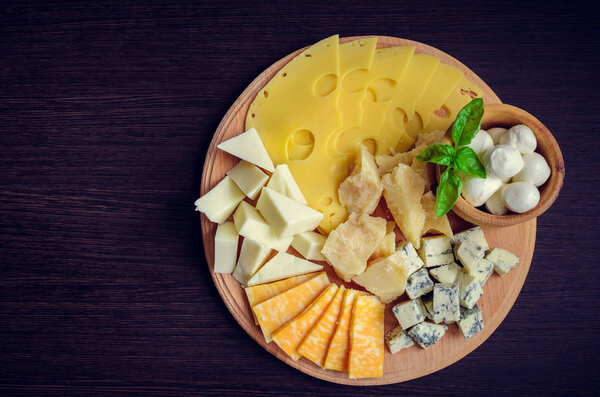 Tasty appetizer. Plate of Cheese.