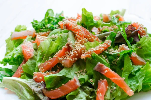 Leaf vegetable salad with smoked salmon