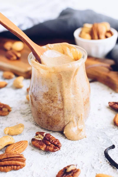 Nut butter in glass jar — Stock Photo, Image