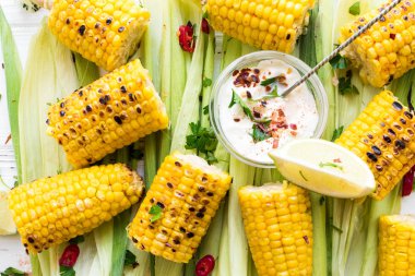 Grilled corn cobs in mexican style