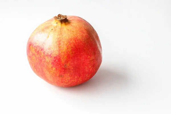 Red pomegranate isolated on white background — Stock Photo, Image