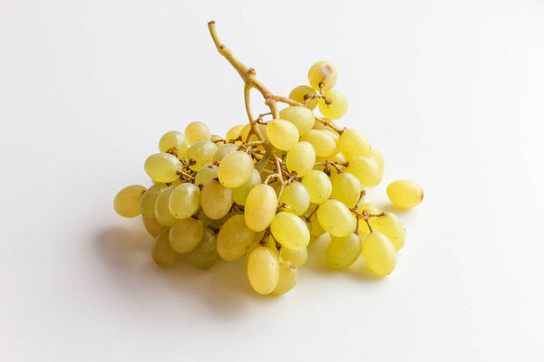 Bunch of green grapes isolated on white background