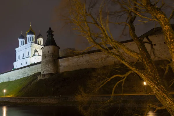 Night view of the Pskov Kremlin. In the foreground is a river