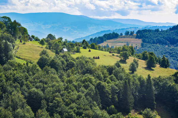 Panoramic view over Carpathian Mountains , Romania in a beautiful summer day