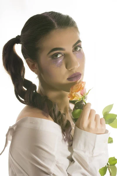 Girl with yellow rose — Stock Photo, Image