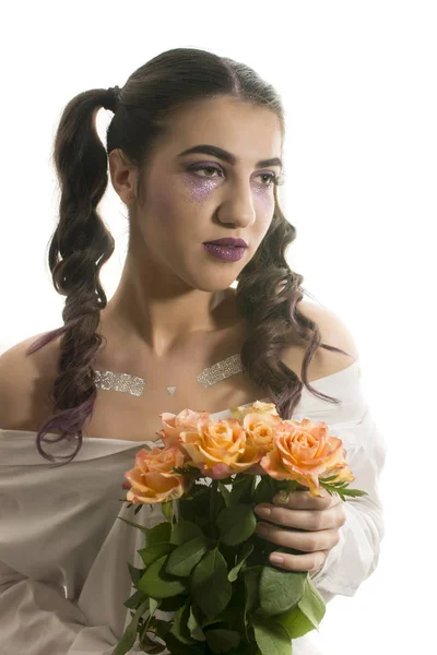 Girl with yellow roses — Stock Photo, Image