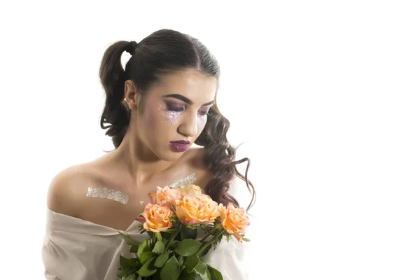 Girl with yellow roses — Stock Photo, Image