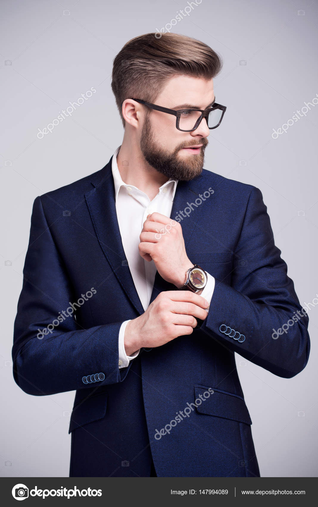 blue suit dark blue shirt