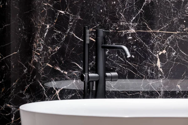 Stylish black bathtub faucet — 스톡 사진