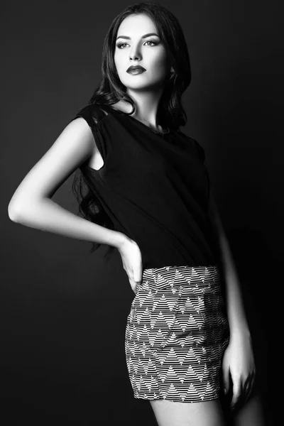 Studio photo of young woman on black background. Black and white — Stock Photo, Image