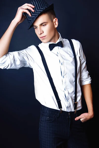 Fashion photo of young model man on black background. Boy posing. Studio photo. — Stock Photo, Image