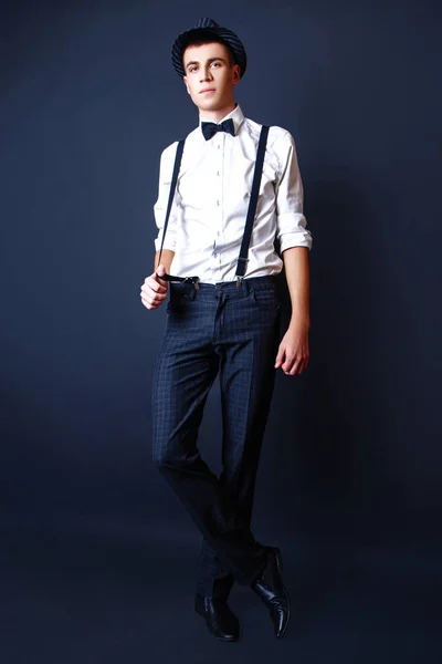 Fashion photo of young model man on black background. Boy posing. Studio photo. — Stock Photo, Image